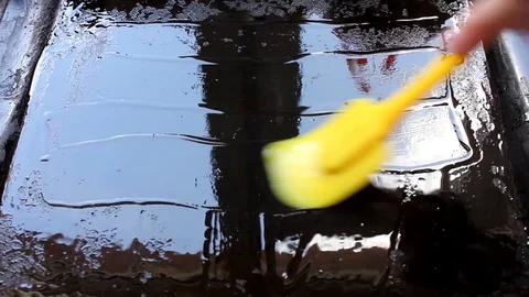 Grease butter baking sheet on kitchen. Stock Footage 129569811