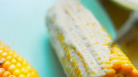 Grease with sauce three planted corn. Mexican corn elote in three ways. Macro Vidéo 170429498