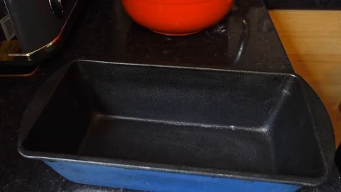 Greasing baking tin Stock Footage 127307785