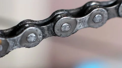 Greasing the chain on a bicycle Stock Footage 8552815