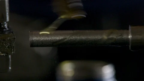 Greasing metal rod on lathe Video stock 93673414