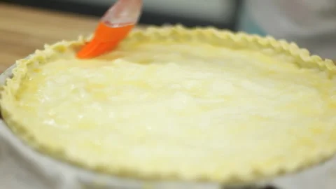 Greasing with oil a pan. Media. Closeup shot and soft focus. Using a pastry Stock Footage 150987633