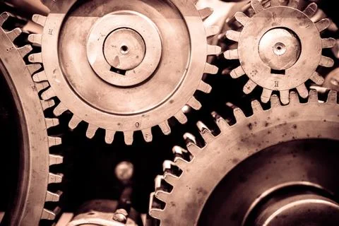 Greasy gears in the machine. Stock Photos