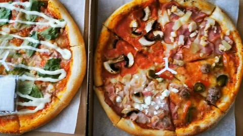 Greasy pizza in a cardboard box.  Stock Footage 196120291