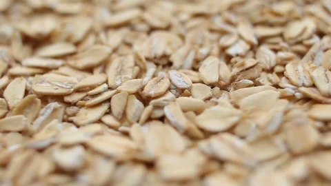 Great background of Whole-grain organic oatmeal rotating close up Stock Footage