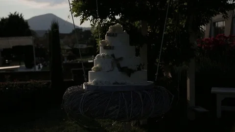 Great beautiful wedding cake, highlighted in different colors Video stock 86601702