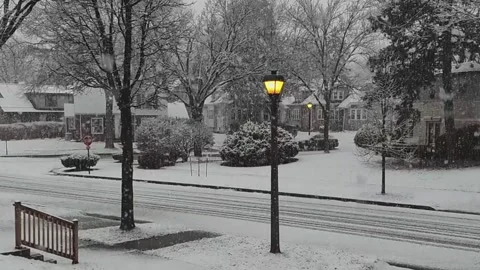 Great Big Snowflakes Gently Falling In A Urban Setting. Stock Footage 326155591
