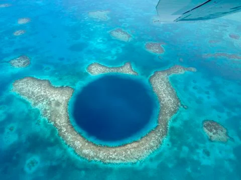 Great Blue Hole and Lighthouse Reef in Belize Stock Photos