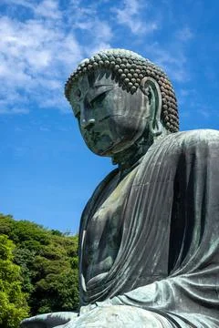 Great Buddha statue close-up view at Kotoku-in temple in Kamakura, Japan Stock Photos