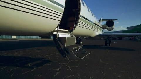Great close-up of private plane parked at airport with the door open Stock Footage 78685316