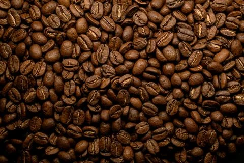 Great composition of brown roasted coffee beans. Can be used as background. Stock Photos