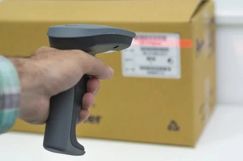 Great concept of traceability, ERP system, hand crawling product barcode and  Stockfoto's