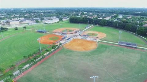 Great daytime Aerial fly over baseball fields at park Stock Footage 69073300