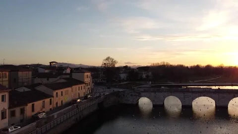 Great Drone Video of Sunset over Ponte di Tiberio and Rimini, Italy Stock Footage 150524202