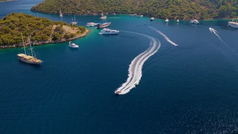 Great fun getting pulled around behind a speeding boat, Fethiye Gulf, Turkey. Stock Footage 122758971