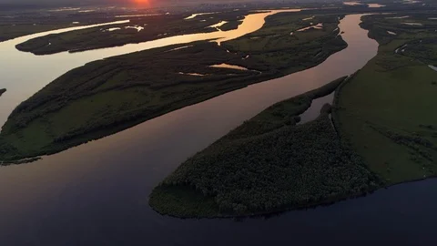From great height largest Lena river sunset network delta Siberia Russia nature Stock Footage 121177785
