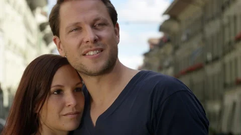 Great looking couple standing together in a beautiful Medieval city. Stock Footage 63018622