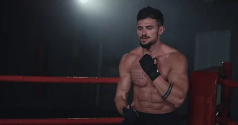 Great looking guy in front of the camera get ready to start his boxing match he Stock Footage 117055214