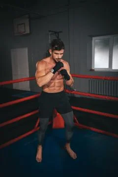 Great looking guy in front of the camera get ready to start his boxing match he Stock Photos