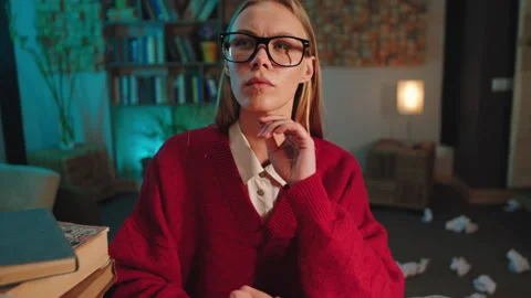 Great looking lady with a thinking face type some documents on the typewriter in Stock Footage 134057128