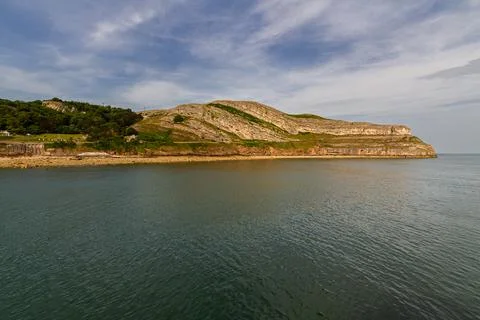 The Great Orme head on a Summer day from the sea. Stock Photos
