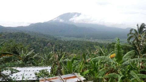 Great panoramic view to big Agung mountain Volcano green jungles Stock Footage 102549567