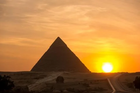 The Great pyramid on sunset Stock Photos