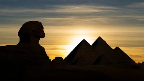 The Great Pyramids Of Giza and Sphinx at Sunset, Time Lapse with Sun and Clouds Stock-Footage 101512369