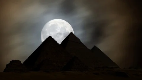 The Great Pyramids of Giza at Night, Time Lapse with Full Moon and Clouds, Ca Stock Footage 101513016