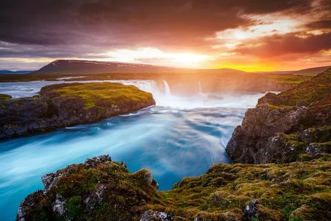 Great rapid flow of water powerful Godafoss cascade. Location place Skjalfand Stock Photos