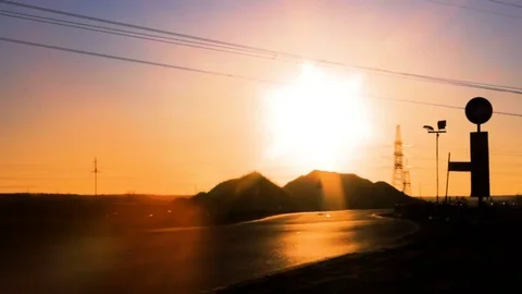 Great Red background Sundown with traffic on the road Stock Footage 73829231