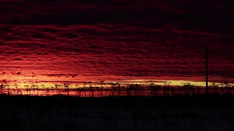 Great Red Sundown at winter timelapse Stock Footage 72868949
