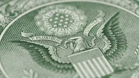 Great seal on 1 US dollar bill slow rotating, bald eagle. Low angle Stock Footage 102222083