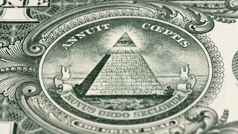 Great seal on 1 US dollar bill tracking, pyramid. Low angle, macro. 8K Stock-Footage 125052309