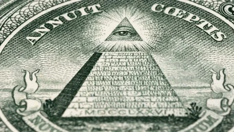 Great seal on 1 US dollar bill tracking, pyramid. Low angle, macro. 4K Video stock 125099332