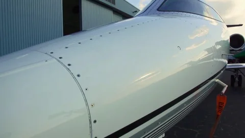 Great shot of the front of a private Jet at Airport Stock Footage 78683862