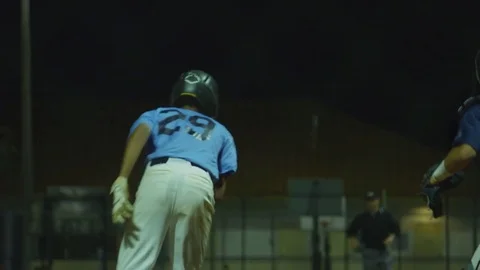 Great slow motion shot of a batter running to first base during a baseball game Stock Footage 83019738