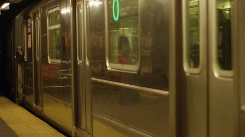 Great Slow Motion of a Train leaving a subway station in New York Stock Footage 85581999