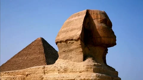 Great sphinx and ancient pyramid in egypt Stock Footage 337310336