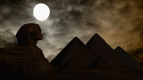 The Great Sphinx and Egyptian Pyramids of Giza: Time Lapse by Night, Egypt Stock Footage 113678701