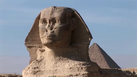 The Great Sphinx and kheops pyramid of Giza close up Stock Footage 71524173