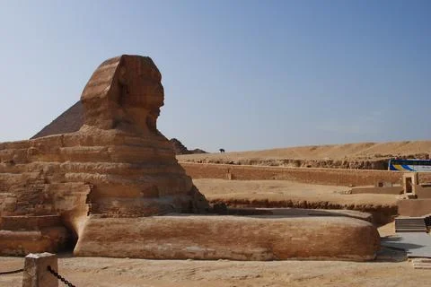 Great Sphinx of Giza side view under the blue sky on a sunny day Stock Photos