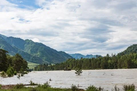 Great spring water on the Katun River and its surrounding mountains, Altai, R Stock Photos