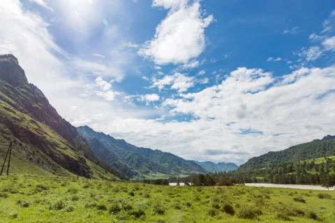 Great spring water on the Katun River and its surrounding mountains, Altai, R Stock Photos