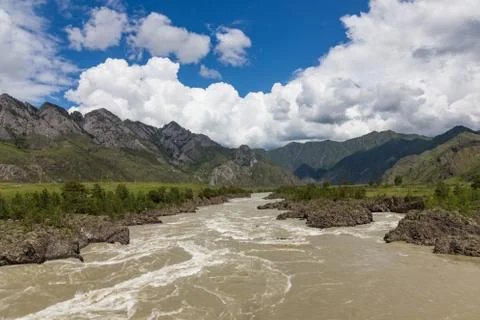Great spring water on the Katun River and its surrounding mountains, Altai, R Stock Photos
