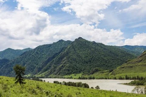 Great spring water on the Katun River and its surrounding mountains, Altai, R Stock Photos