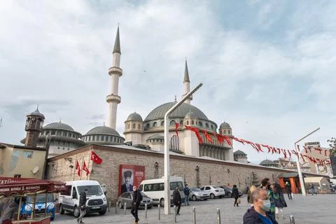 Great Taksim Mosque in Taksim Avenue with Turkish flags and people in Istanbul Stock Photos