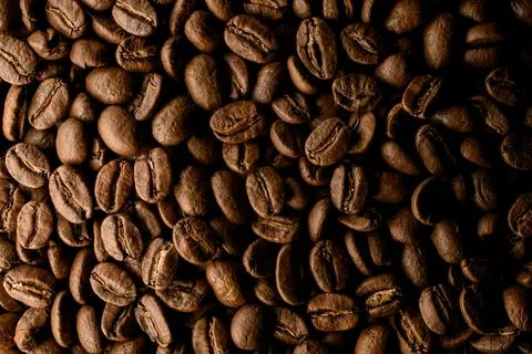 Great view on composition of brown roasted coffee beans. Can be used as Stock Photos