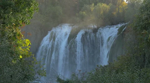 Great view of Kravice waterfall surrounded by trees Video stock 60382162