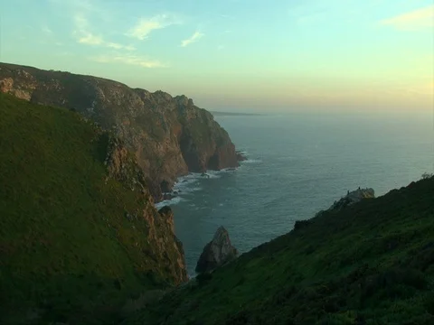 Great view on ocean cliff, mountain in green grass, waves crushing Stock-Footage 73152906